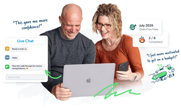 A couple sitting at a computer together with budgeting 101 workshop encouragement around them