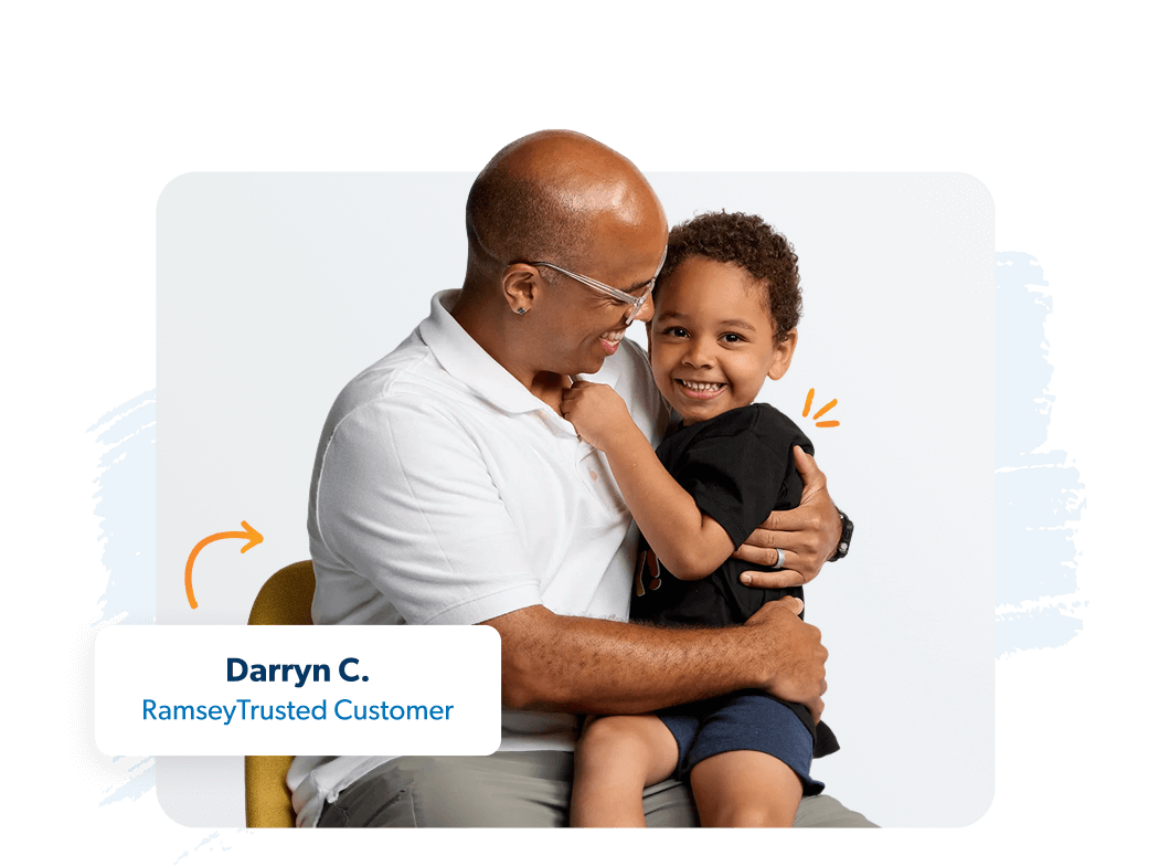 A dad and young son sitting together